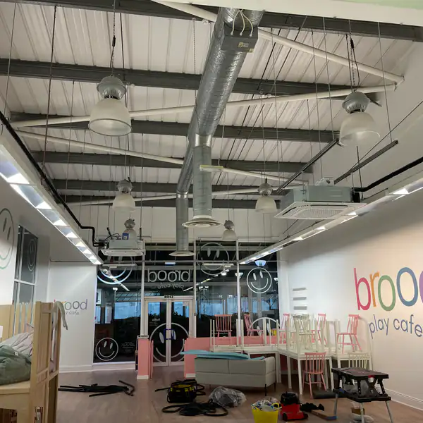 Ceiling-mounted air conditioning installed in a café and play space in Bristol