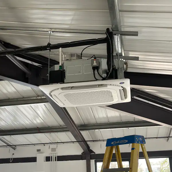 Ceiling cassette air conditioning unit installed in a commercial unit in Bristol