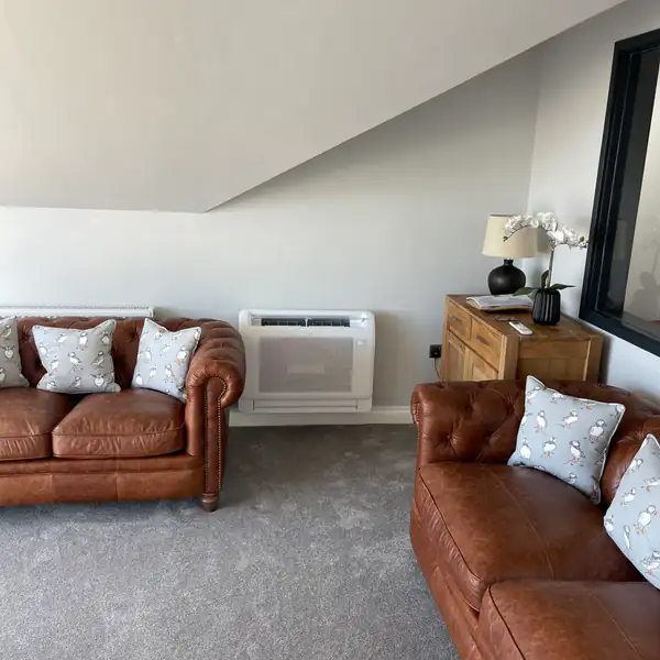 Floor-standing console air conditioning unit in a Bristol living room
