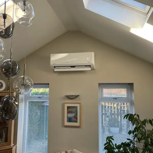 Split air conditioning unit in a vaulted garden room in Bristol