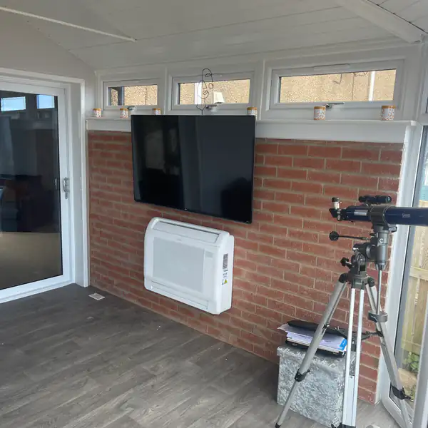 Floor console air conditioning unit in a garden room in Bristol